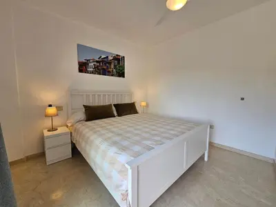 Cama o camas de una habitación en Comfortable modern house with jacuzzi, and access to swimming pool