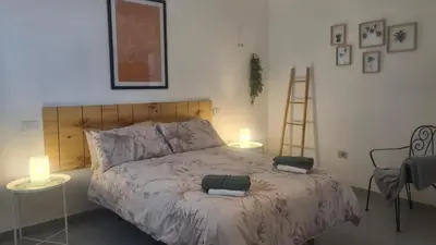 Cama o camas de una habitación en ARINAGA ARENA Y MAR BEACH