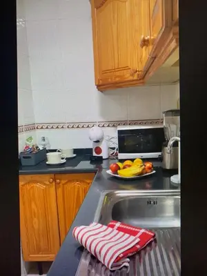 Una cocina o zona de cocina en Apartamento Benemar