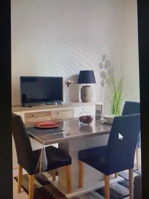 Una televisión o centro de entretenimiento en Apartamento Benemar