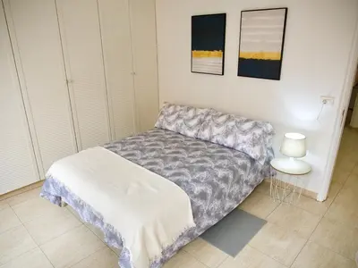 Cama o camas de una habitación en APARTAMENTO PLAYA ALCARAVANERAS