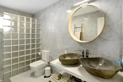 Un baño de Luxury Boho Villa with Heated Pool, Rooftop and Panoramic Sea View in Amadores