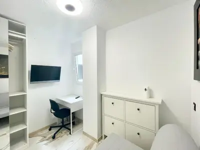 Una televisión o centro de entretenimiento en Piso Canteras/2 Bedroom+Balcony+Parking at Beach