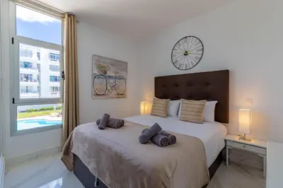 Cama o camas de una habitación en HORIZON VACATION HOME - Luxury Condo near Yumbo