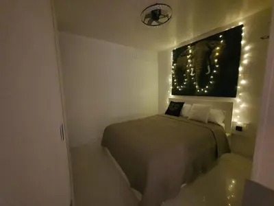 Cama o camas de una habitación en Winnie's Homestay