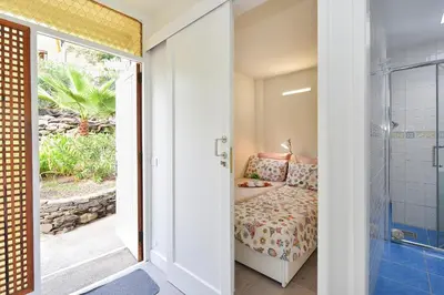 Cama o camas de una habitación en Bungalow Rocas Rojas 406B by VillaGranCanaria