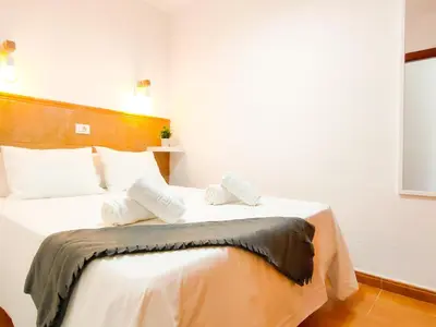 Cama o camas de una habitación en Sweet Friendly Holiday Home