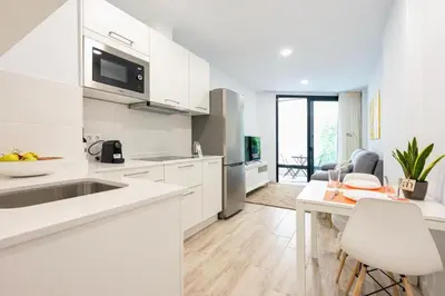 Una cocina o zona de cocina en Famara Suites