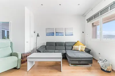 Zona de estar de Home2Book Stylish Front Line Las Canteras Beach