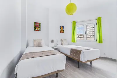 Cama o camas de una habitación en Home2Book Delightful Apartment Las Canteras