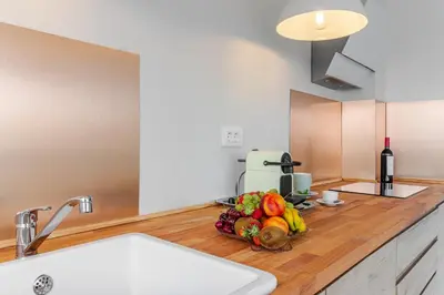 Una cocina o zona de cocina en Santa Brigida Window Suite