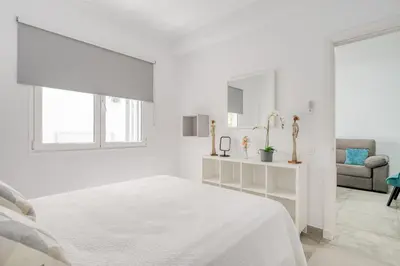 Cama o camas de una habitación en Aventura Las Canteras