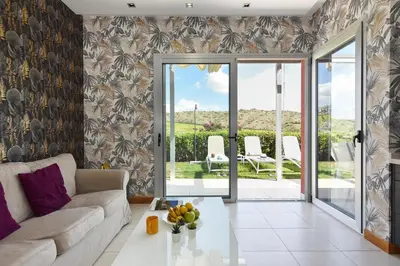 Zona de estar de Vista Golf 22 by VillaGranCanaria