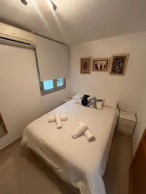 Cama o camas de una habitación en Vista de Mar