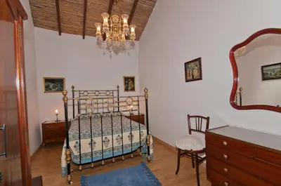 Cama o camas de una habitación en Cuevas Morenas