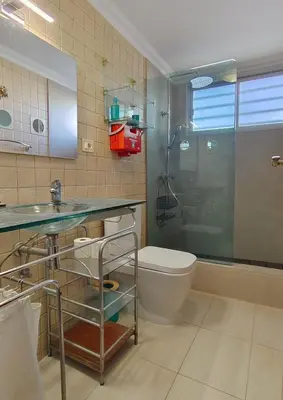 Un baño de Lizards Lounge - Tanife Apartment beim Yumbo