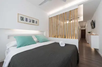 Cama o camas de una habitación en SG Grand Sunset Beach
