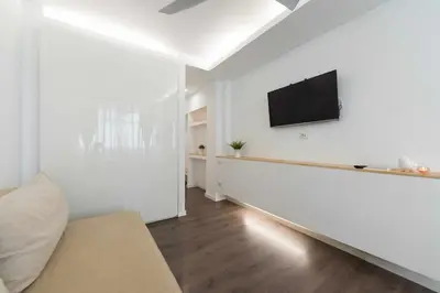 Una televisión o centro de entretenimiento en SG Grand Sunset Beach