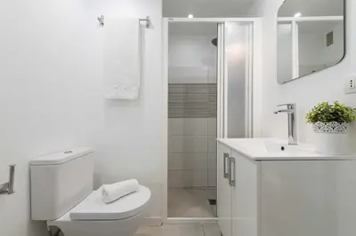Un baño de SG Grand Sunset Beach