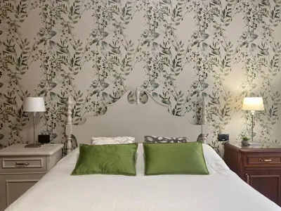 Cama o camas de una habitación en La Minilla Suite