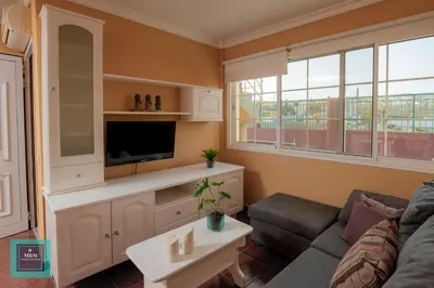 Una televisión o centro de entretenimiento en Inma Apartment Montaña La Data