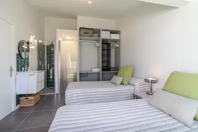 Cama o camas de una habitación en Beach Luxury Bungalow