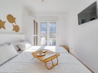 Cama o camas de una habitación en MoganSol Apartment