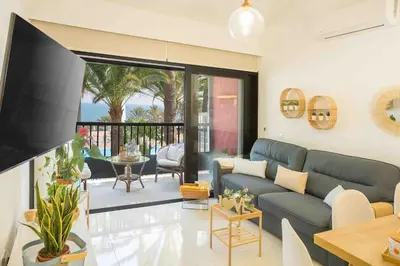 Una televisión o centro de entretenimiento en APARTAMENTO GRAN CANARIA 1º LINEA