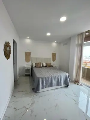 Cama o camas de una habitación en Apartamento Casa Blanca