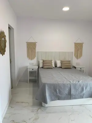 Cama o camas de una habitación en Apartamento Casa Blanca