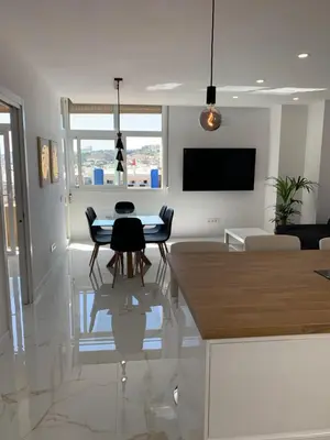 Una televisión o centro de entretenimiento en Apartamento Casa Blanca