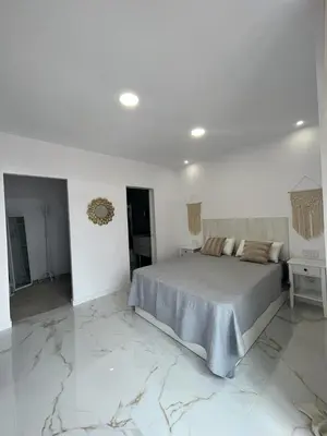 Cama o camas de una habitación en Apartamento Casa Blanca