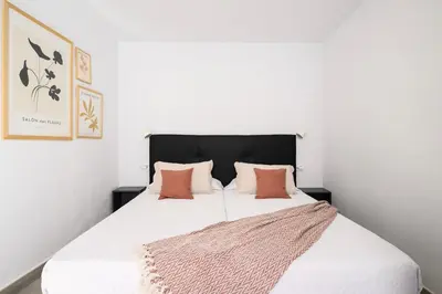 Cama o camas de una habitación en Vegueta Rooftop Suites by Airnest
