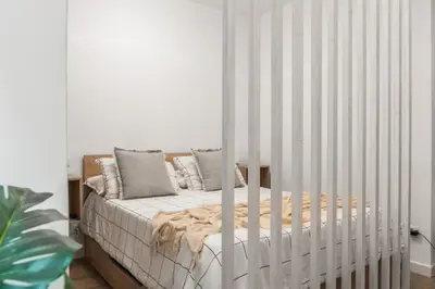 Cama o camas de una habitación en Nomad, Wifi , Espacio trabajo ,Playa ,Ocio