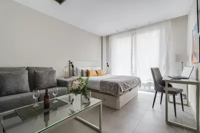 Cama o camas de una habitación en Home2Book Elegant Studios Art & Design Las Palmas