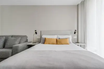 Cama o camas de una habitación en Home2Book Elegant Studios Art & Design Las Palmas