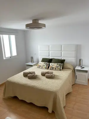 Cama o camas de una habitación en Ático a 200 metros de la playa