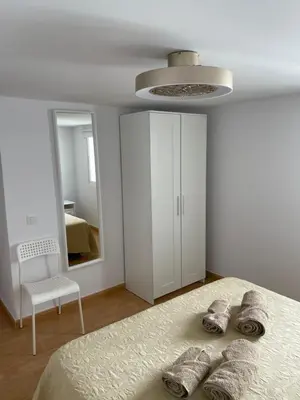 Cama o camas de una habitación en Ático a 200 metros de la playa