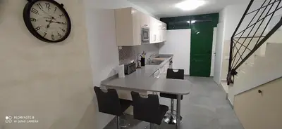 Una cocina o zona de cocina en Bungalow Casa Arena