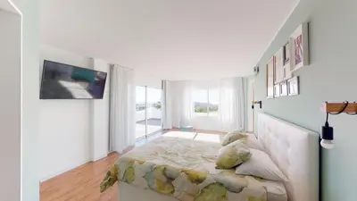 Una televisión o centro de entretenimiento en Sunset Villa - Maspalomas by Home Stay Gran Canaria