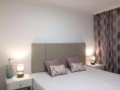 Cama o camas de una habitación en The SunSpot Apartment Playa del Inglés