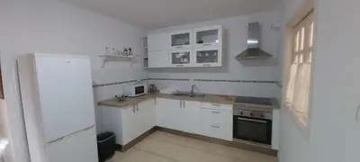 Una cocina o zona de cocina en LA CASITA VECINDARIO