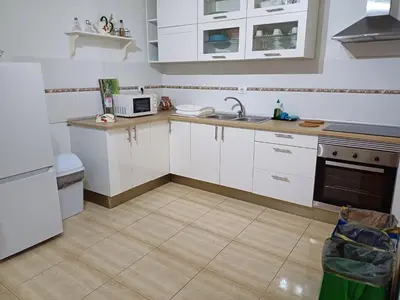 Una cocina o zona de cocina en LA CASITA VECINDARIO