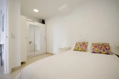 Cama o camas de una habitación en Holiday apartment with direct sea promenade access