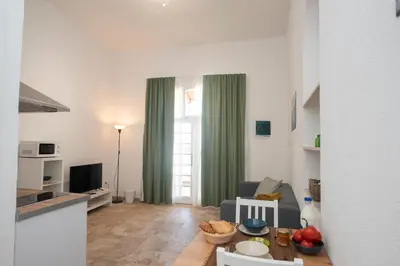 Una televisión o centro de entretenimiento en Wohnung Aulaga