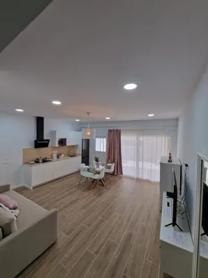 Una televisión o centro de entretenimiento en Alojamientos Agaete Pueblo Nº4 y Nº5