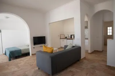 Una televisión o centro de entretenimiento en Wohnung Esterlizia