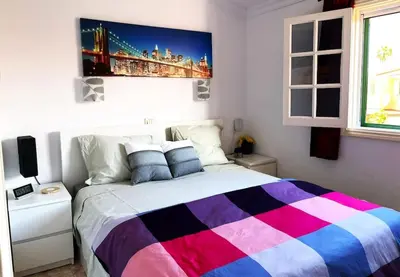 Cama o camas de una habitación en Bungalow Los Parrales 17