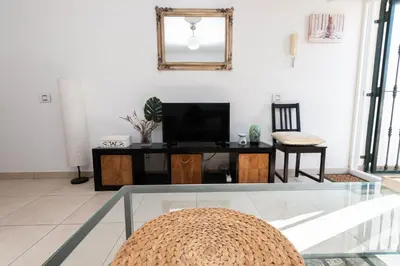 Una televisión o centro de entretenimiento en Gemini Maspalomas