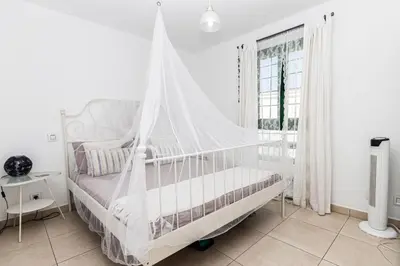 Cama o camas de una habitación en Gemini Maspalomas